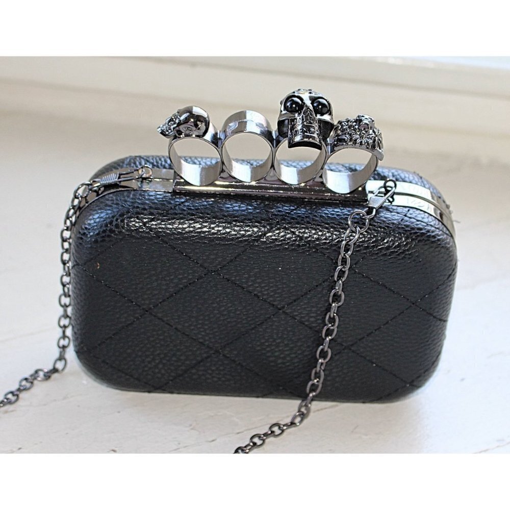 Skull Knuckle Clutch, faux McQueen-type, One stone missing